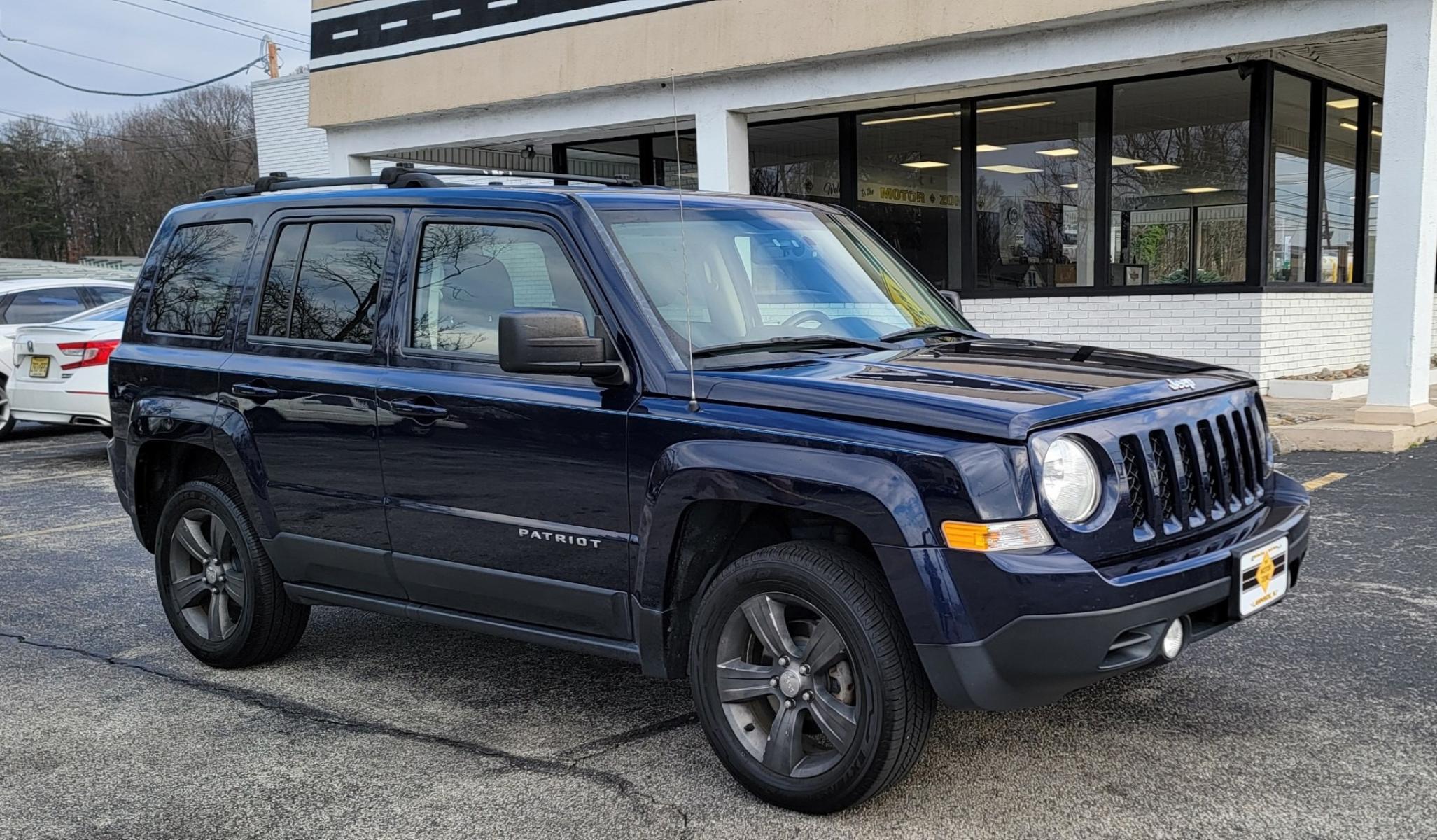 2015 Blue /Black Jeep Patriot Latitude (1C4NJRFB0FD) with an 4-Cyl, 2.4 Liter engine, Automatic transmission, located at 341 N White Horse Pike, Lawnside, NJ, 08045, (856) 262-9500, 39.855621, -75.027451 - Photo #0